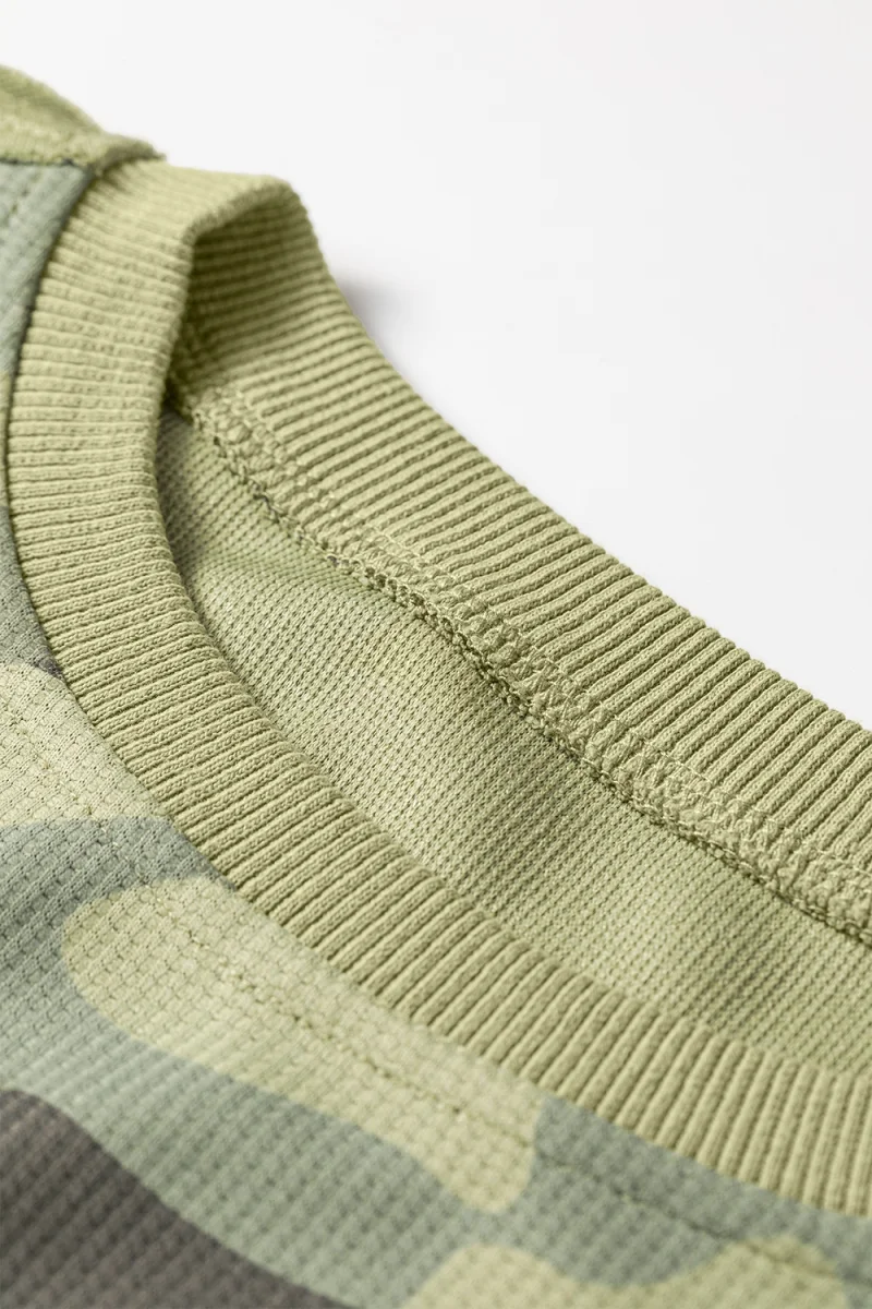 Camouflage Waffle Knit Raw Edge Contrast Trim Oversized Long Sleeve Top - Image 14 | Lily's Pad Studio